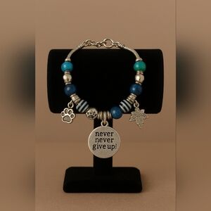 Silver Charm Bracelet with Blue Beads